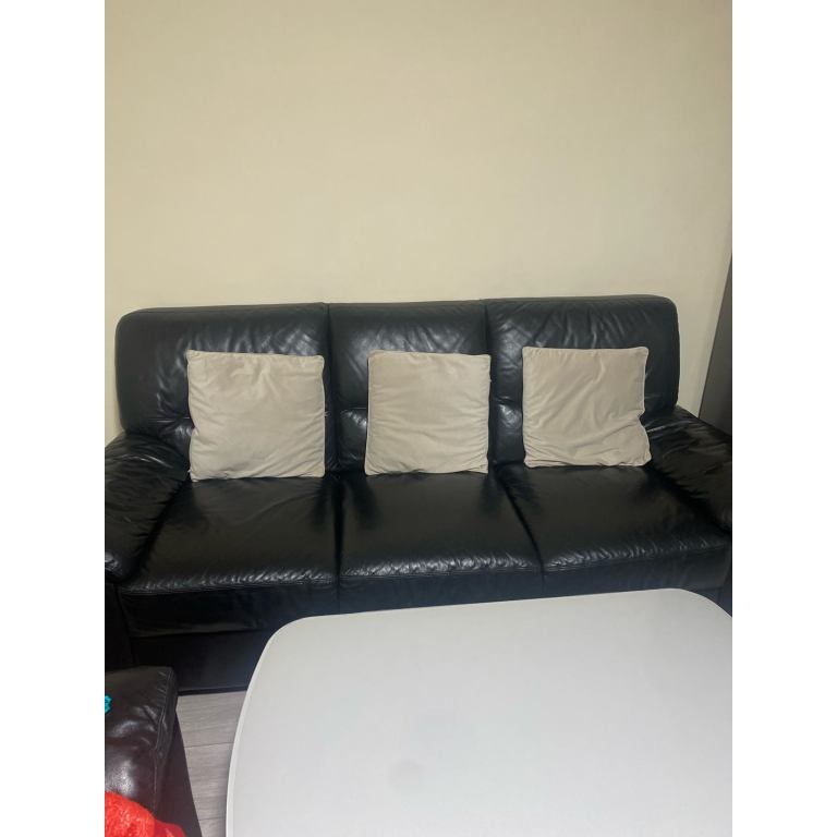2 black dfs 3 seater sofas