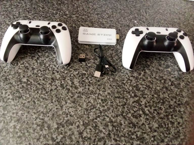 Retro Game Stick with 2 Wireless Controllers – Good Condition
