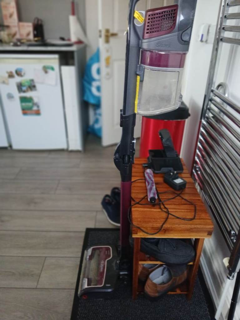 Shark Anti Hair Wrap Cordless Vacuum includes Brochure and instructions