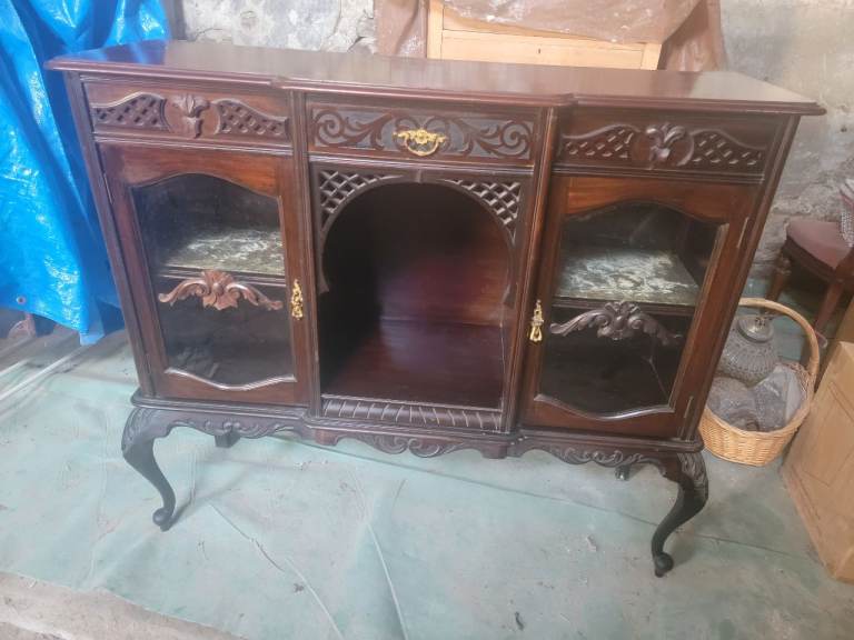 Dark wood antique china cabinet