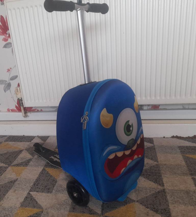Childrens folding scooter & travel bag.