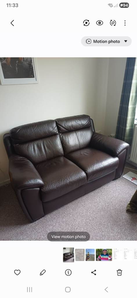 Brown leather sofa.