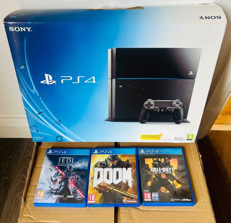 PlayStation 4 console BOXED with games PS4