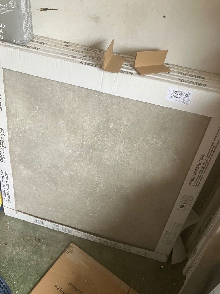Porcelanto stone ware grey mottled floor tiles