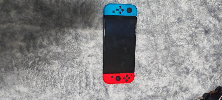 Nintendo switch OLED with one game 