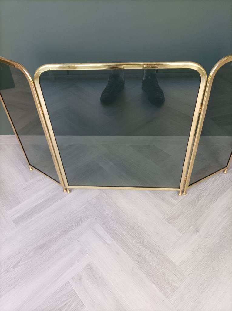 Brass and glass Fireguard.