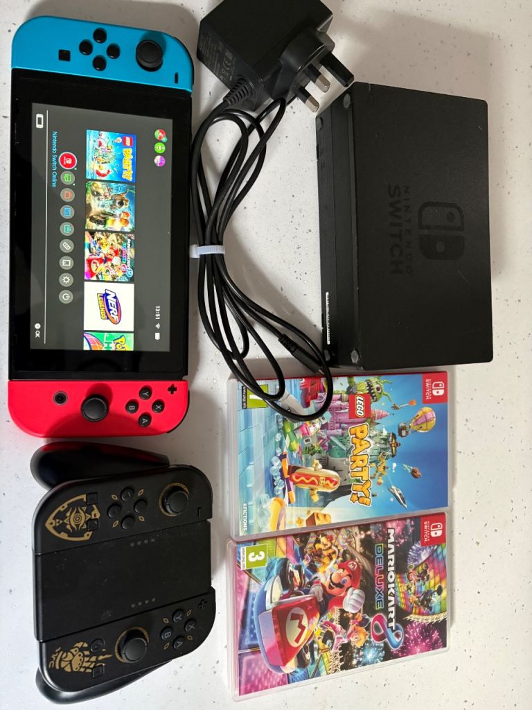 Nintendo Switch Console with Games and Controllers – Good Condition