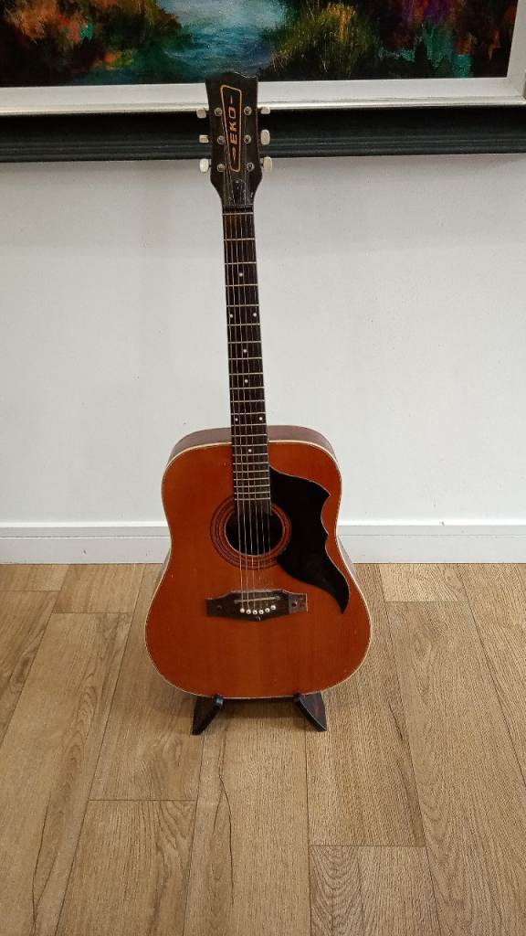 EKO Acoustic Guitar with Stand – Good Condition