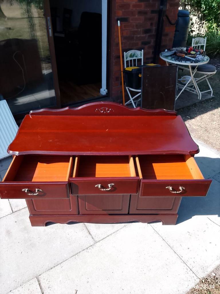 Mahogany sideboard with 3 drawers. 2 cupboards and 2 shelves