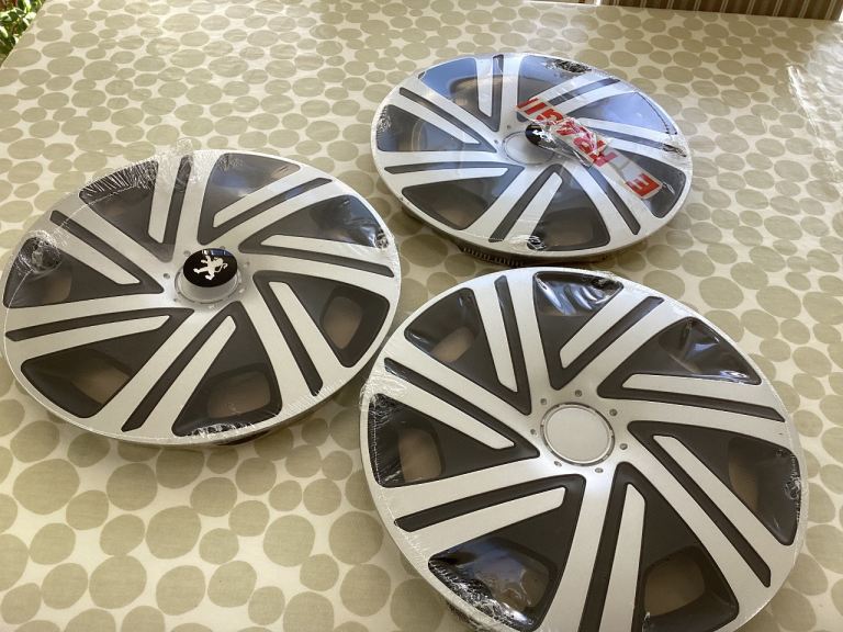 16 inch wheel trims . Three available. Unused.