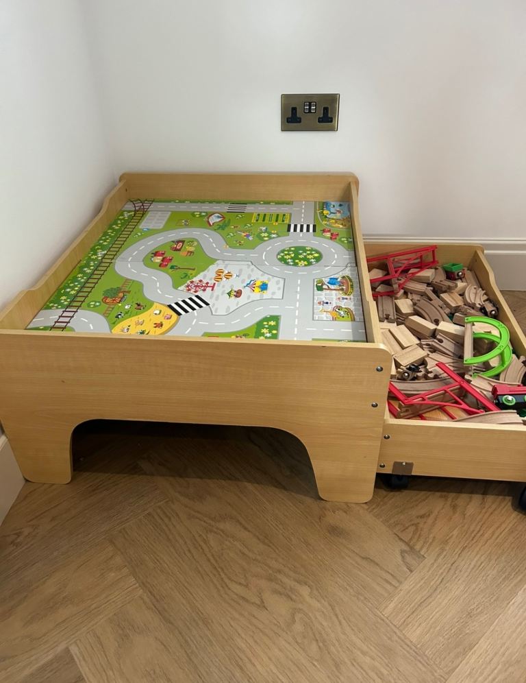 Wooden train table and storage
