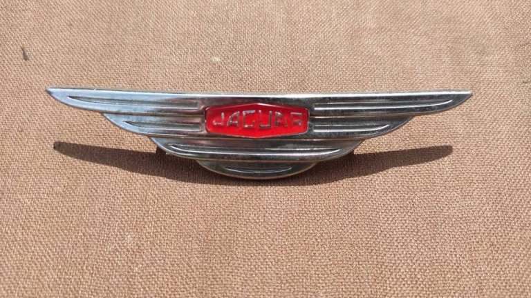 Vintage Jaguar car badge
