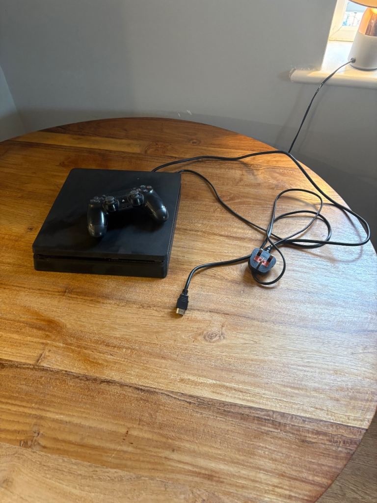 PlayStation 4 slim with 1 controller for sale