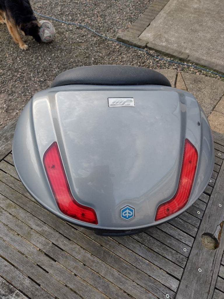 Large Topbox & mounting plate & key. Good condition, Genuine Piaggio – takes 2 x helmets