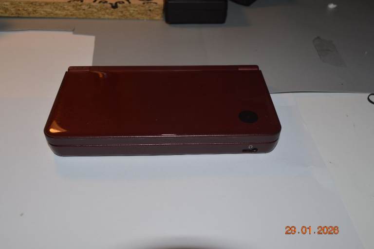 Nintendo DSI XL Console Burgundy with Charger and 3 boxed games.