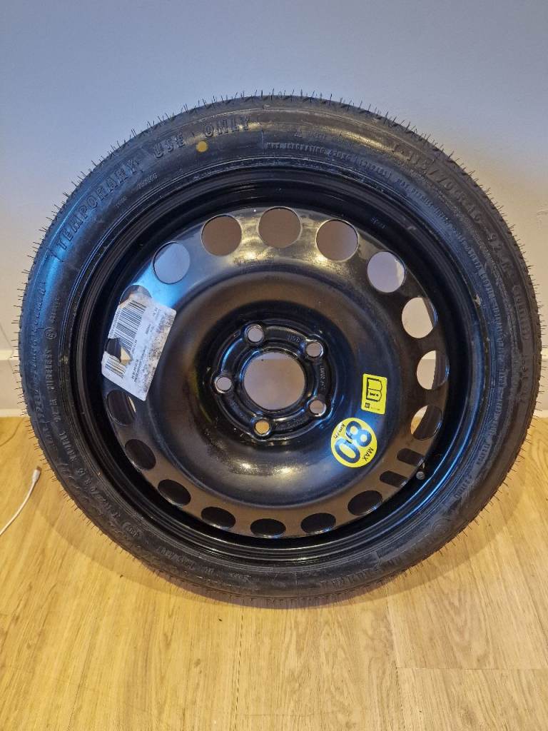 Spair tyer 115/70 R 16  92m continental