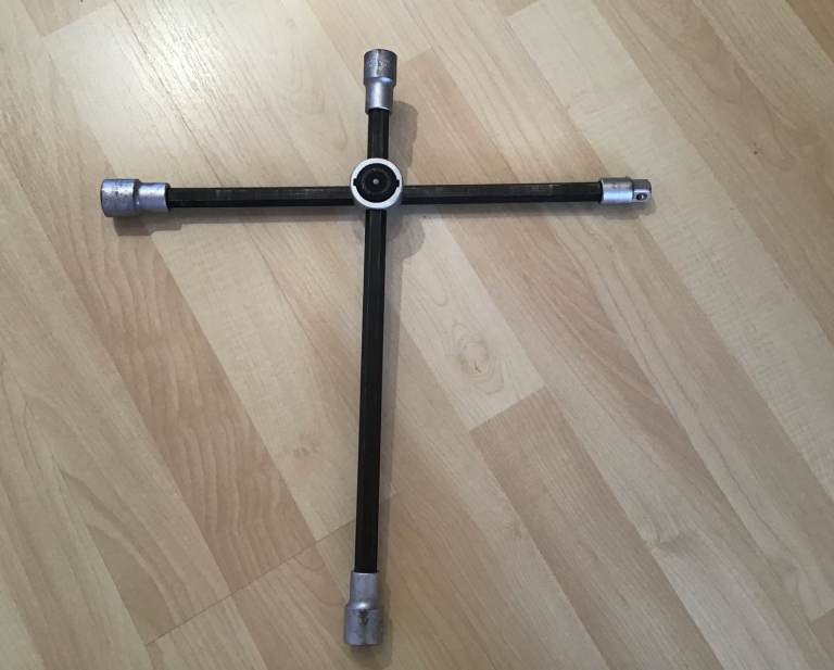 Wheel nut cross wrench/brace with sliding joint. 1/2” socket drive with ball lock and 17,19,21mm