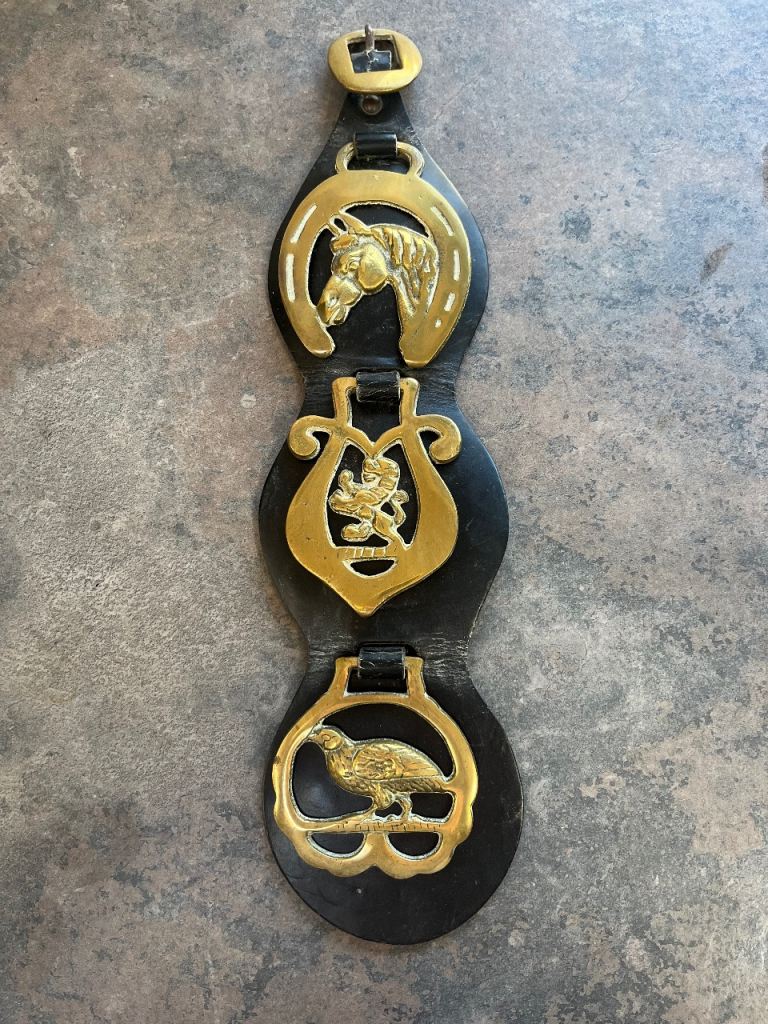 Horse brasses on leather backing