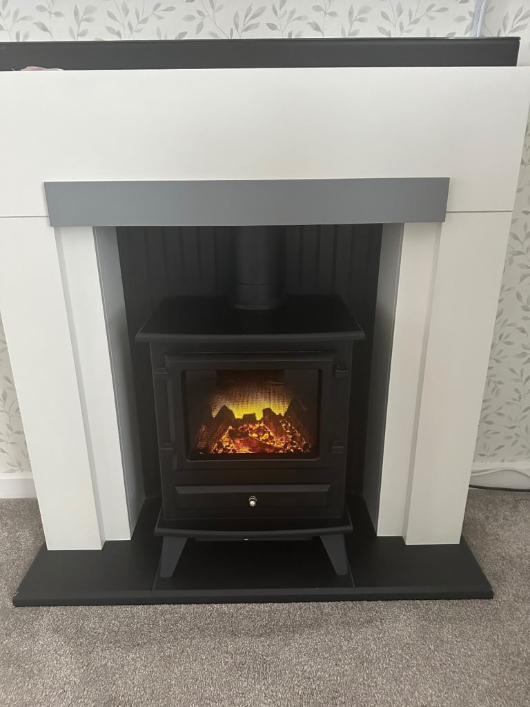 Adam fireplace suite. Good condition. Barely used 