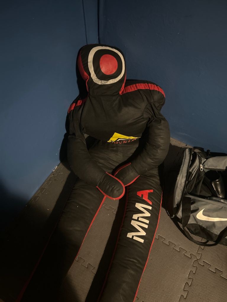 Wrestling dummy . Filled