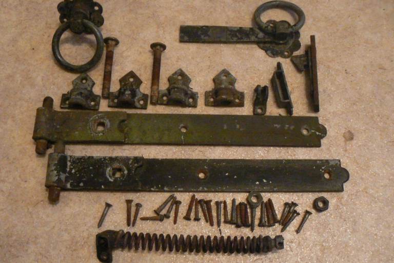 Cast iron furniture for a garden gate.