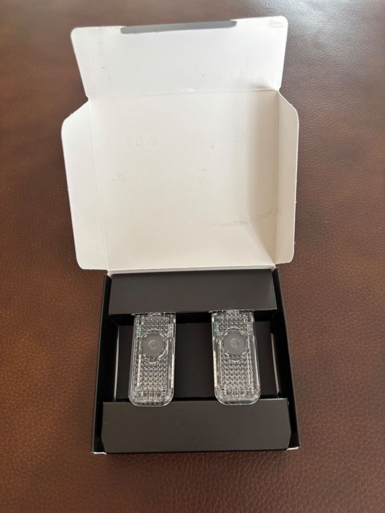 Genuine Audi door light ( 4 rings )