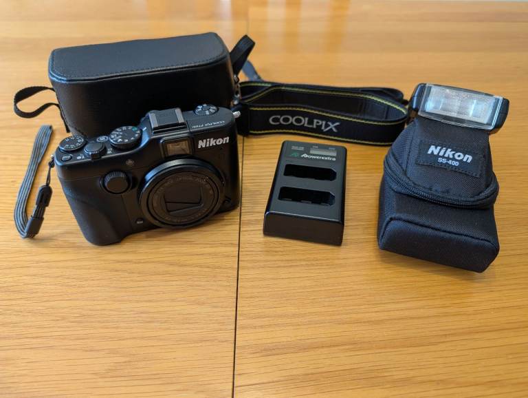 Nikon COOLPIX P7100 Digital Camera Bundle with SB-400 Speedlight