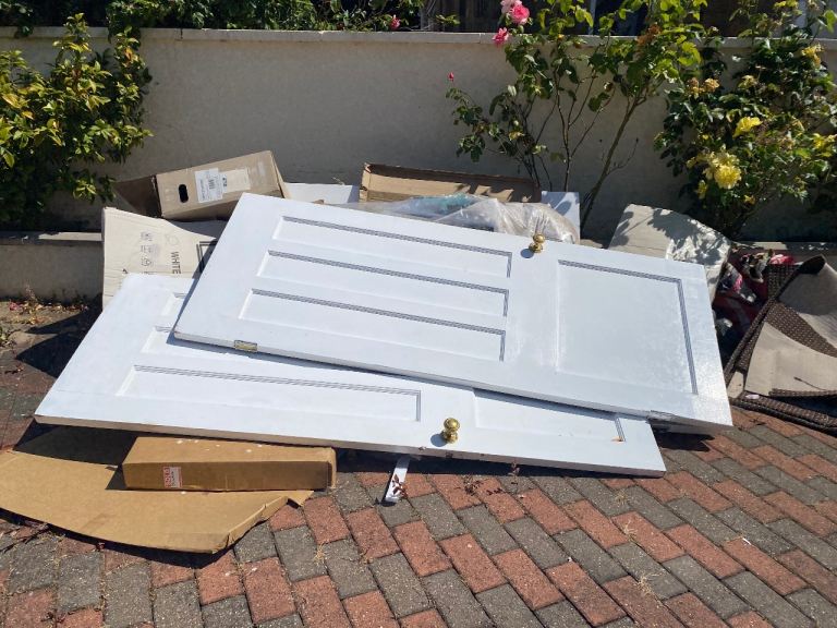 Pair of White Internal Doors with Brass Knobs