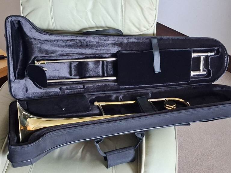 Trombone in decent case.