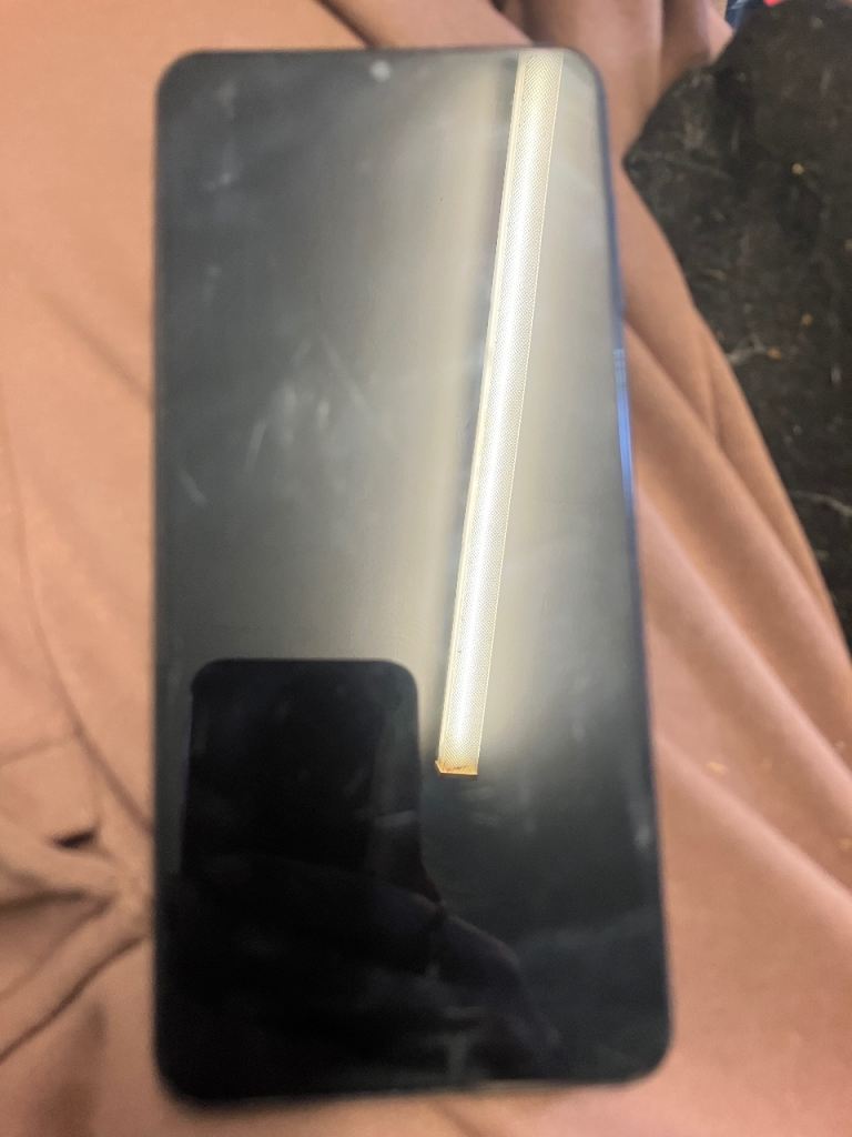 Black Smartphone with Screen Damage – Fair Condition