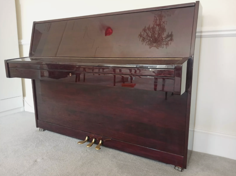 Waldstein piano in dark mahogany finish bought from Bath Piano Shop