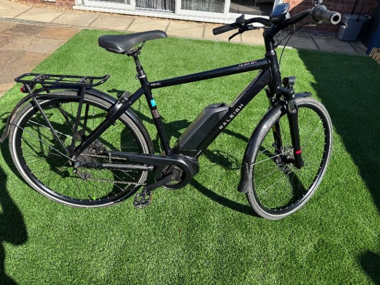 Raleigh motus grand tour 7 speed hub gears electric bike.