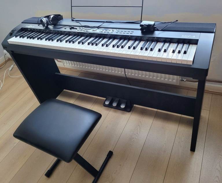 Complete set SDP-4 piano, stand, headset, power plug and stool. £150 offers considered 