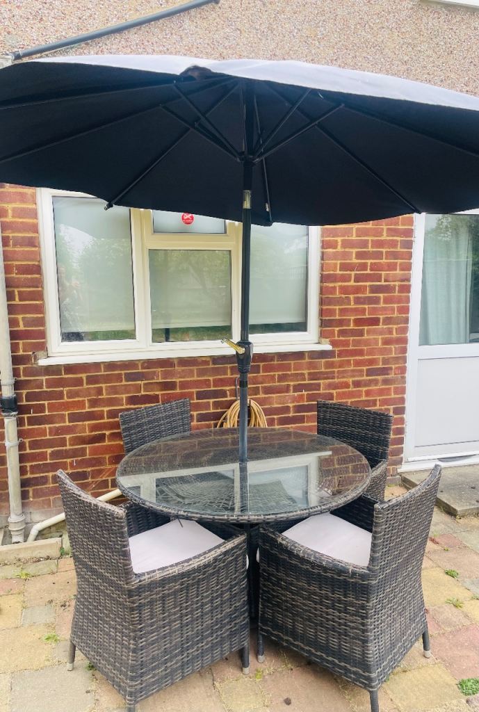 FREE Garden Table & Chairs set. Includes cushions, umbrella and metal base. 