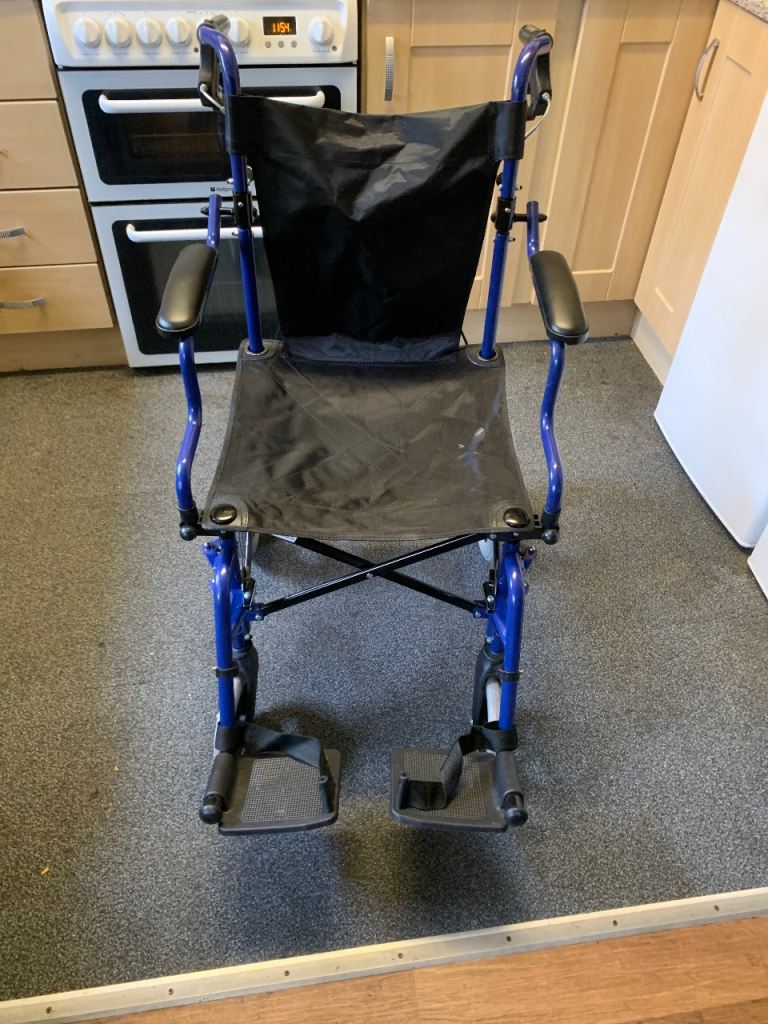 Blue Folding Wheelchair – Good Condition
