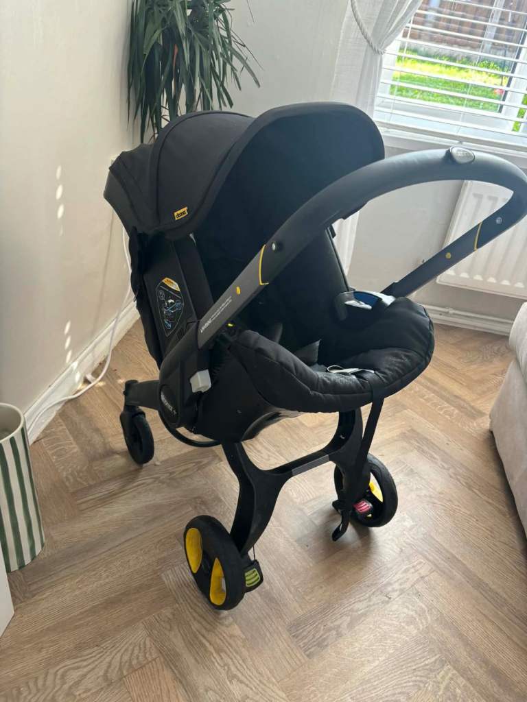 Black Nitro Doona pram 