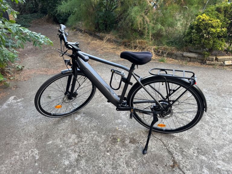 Elops Electric City Bike with Pannier Rack – Good Condition