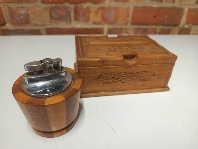 Vintage lighter and magic ciggie dispenser box.