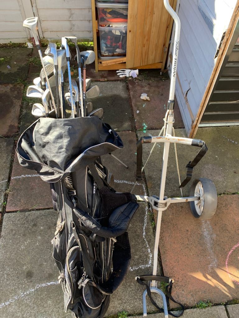 2 sets + more golf clubs, bag and trolley