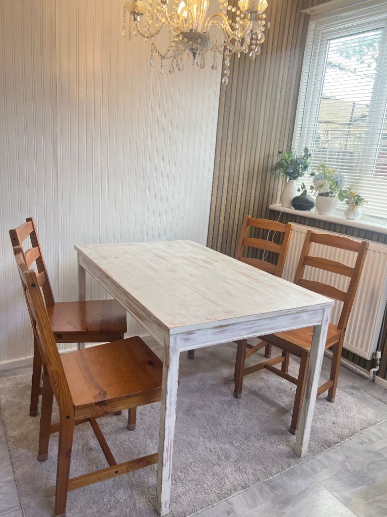 Wooden Ikea dining table with 4 chairs 