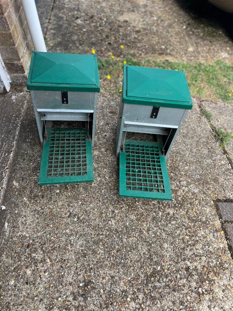 2  automatic chicken feeders