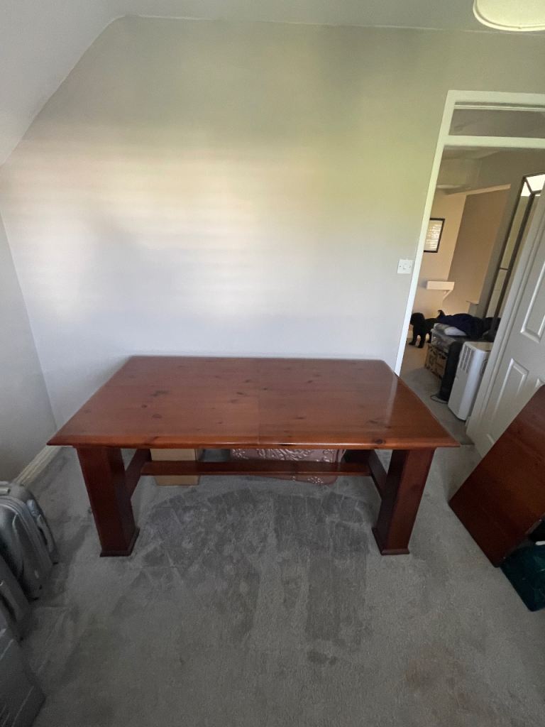 Solid Wood Dining Table – Good Condition