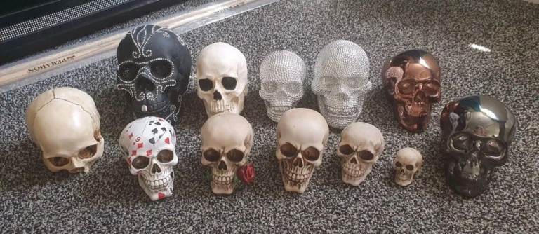 Lot of 12 x assorted skull ornaments/money boxes vgc