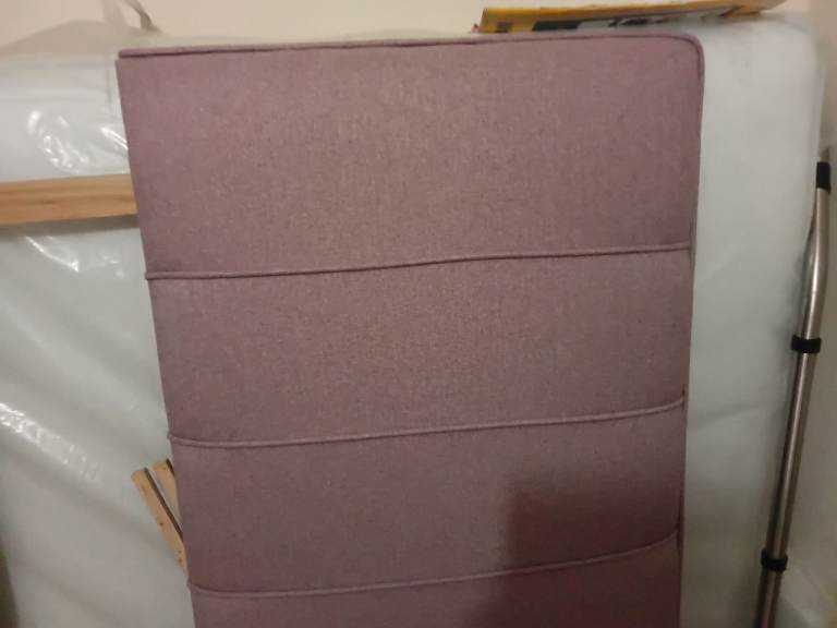 Double headboard from Dreams.  Brand new.  Cost 300.00. 