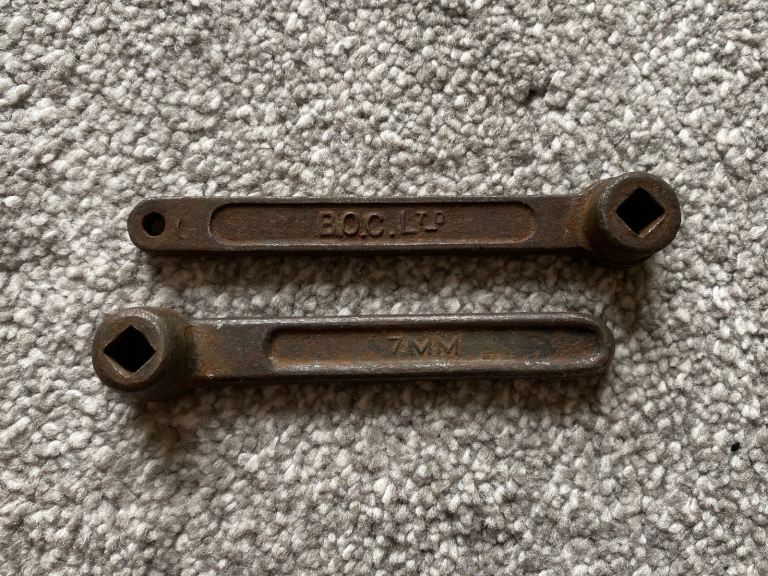 Pair of vintage spindle key spanners
