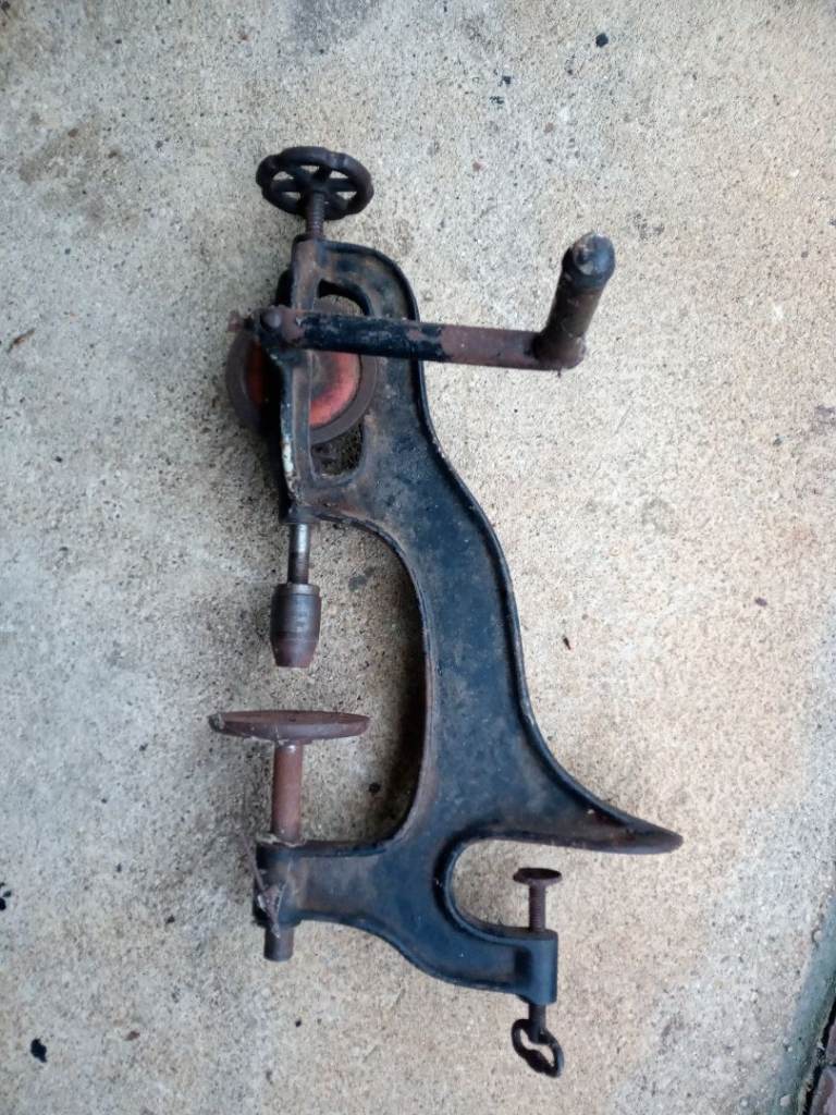 Vintage, manual bench drill/press, cast iron, around 100 years old.