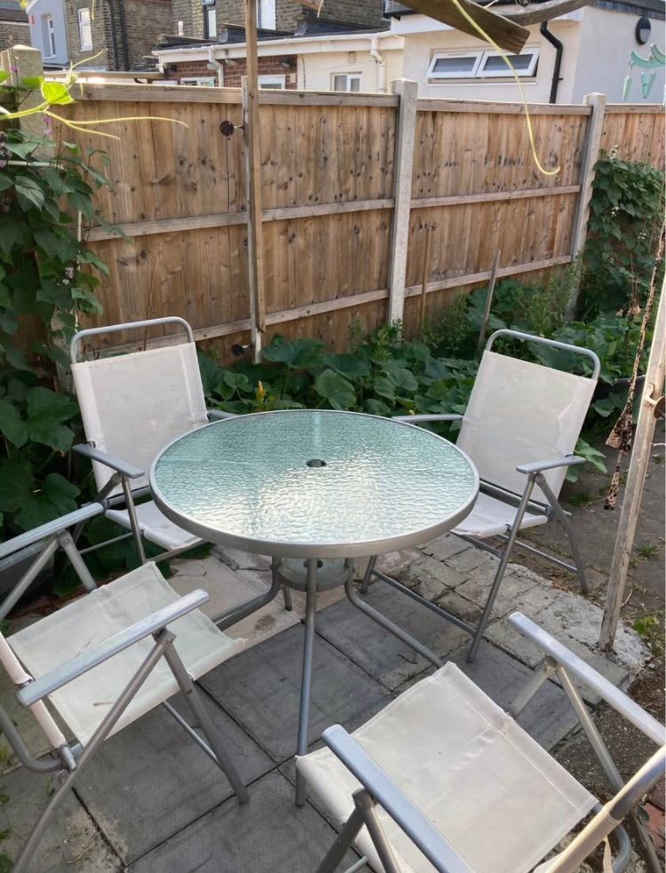 image for Garden Table and 4 Folding Chairs
