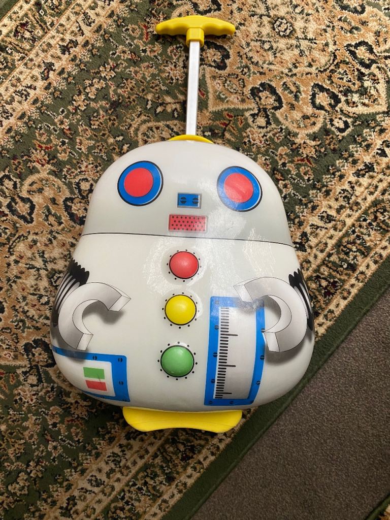 Suitecase child’s rolling on light up wheels