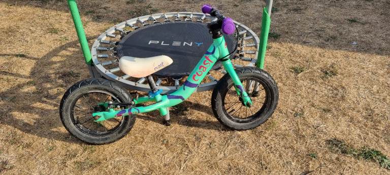 Carrera Coast kids balance bike with 12.5 inch tyres in green