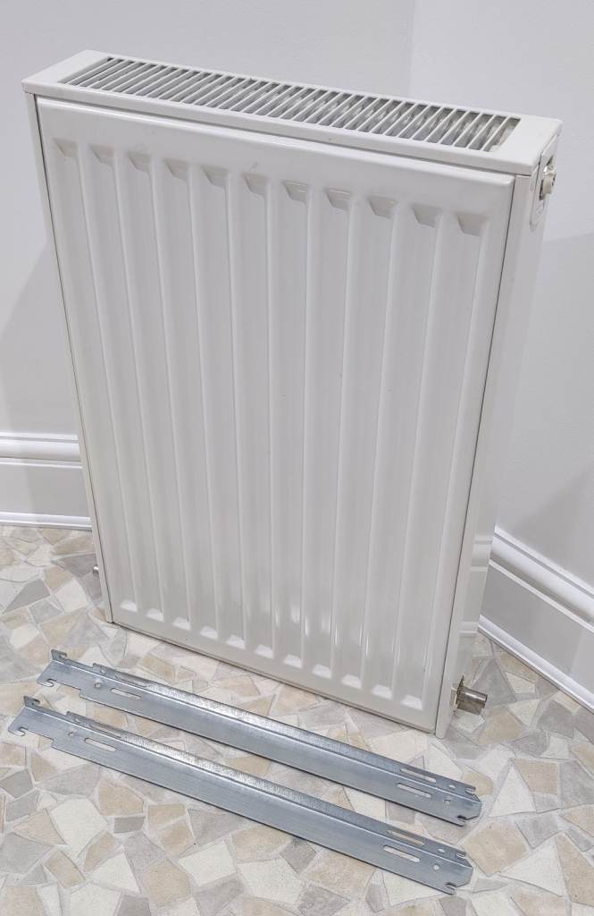 Central heating double radiator including brackets and covers